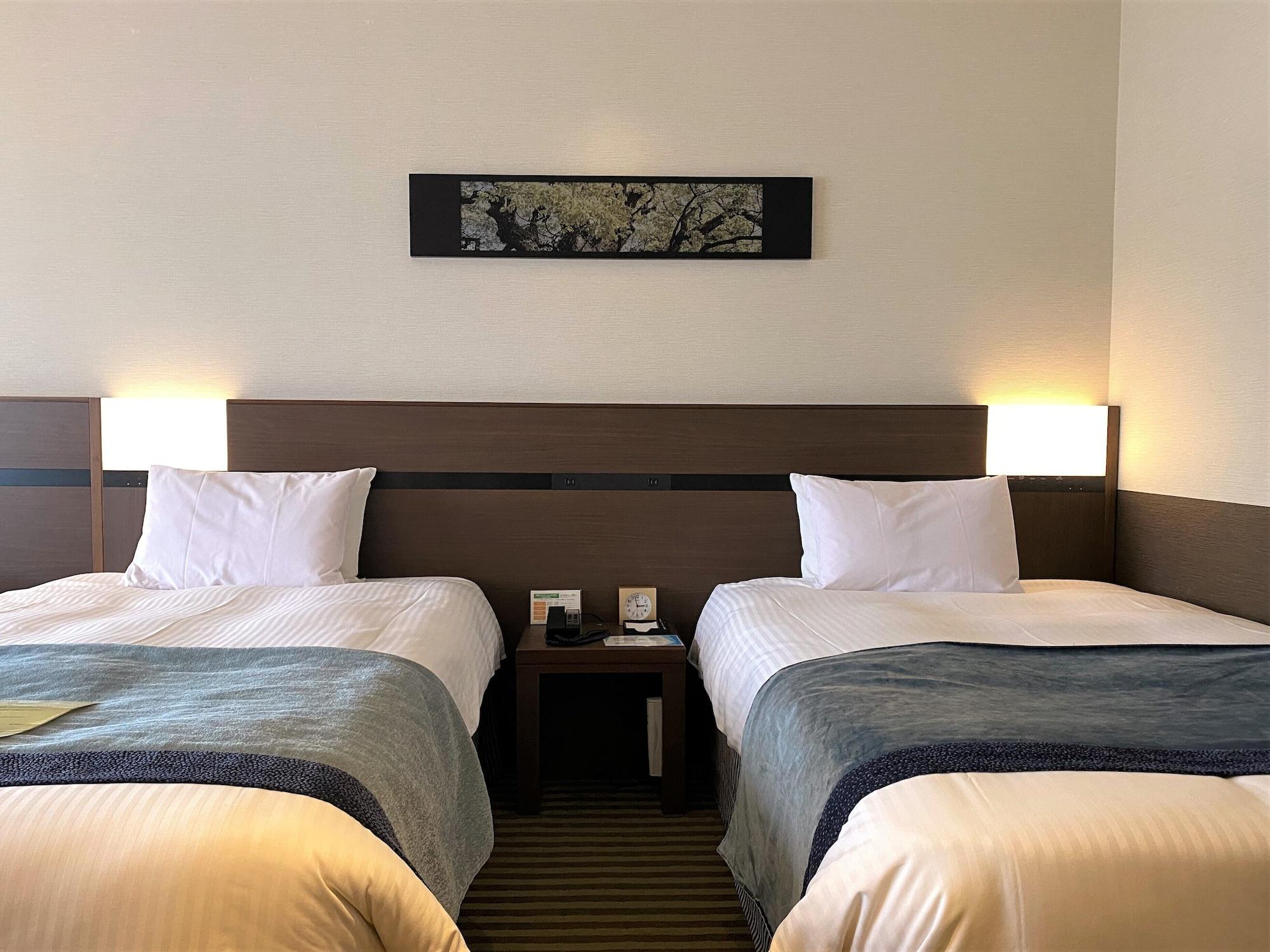 Kobe Portopia Hotel Exteriér fotografie A room at the hotel